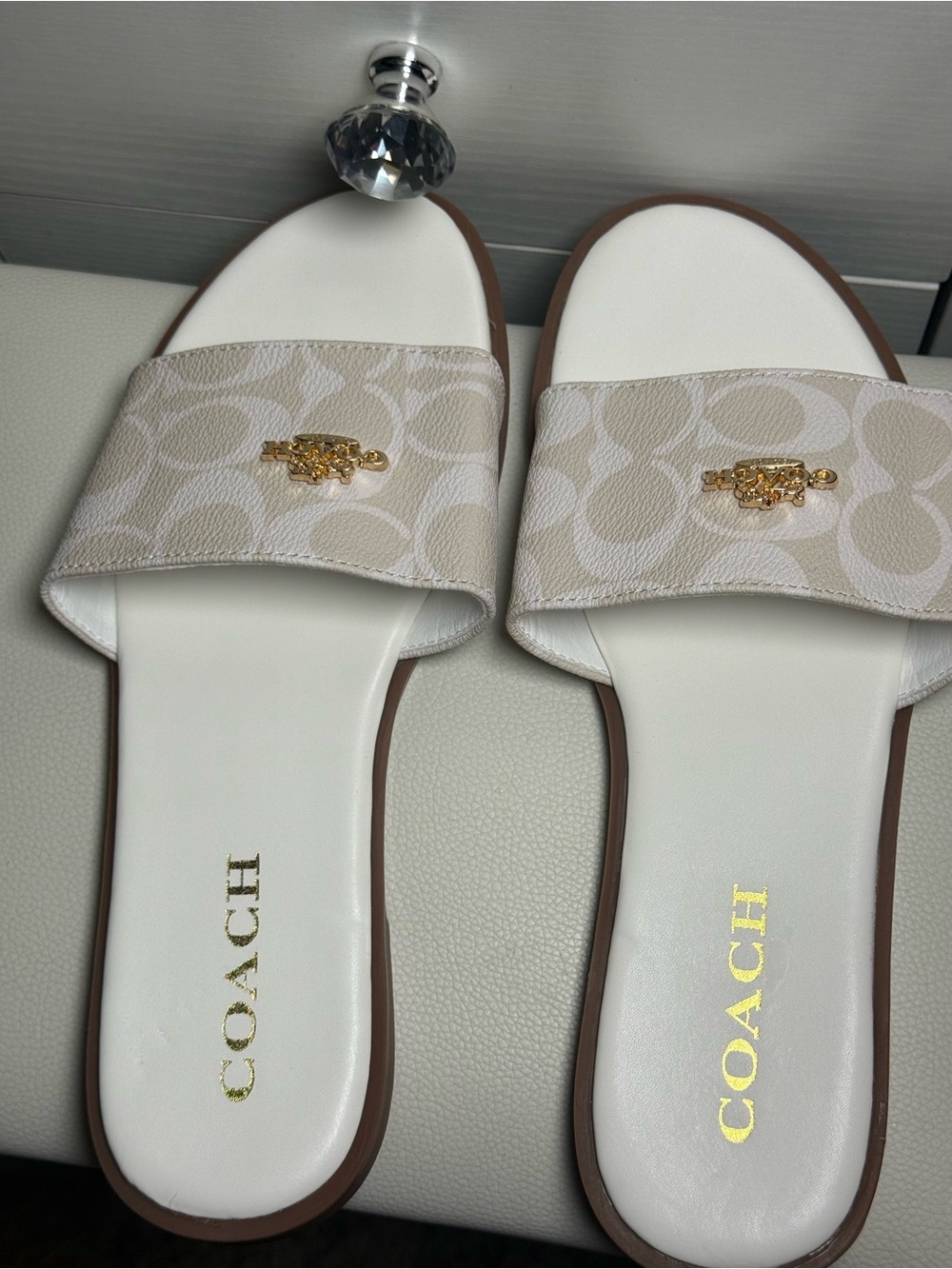 COACH Beige Logo Slide Sandals with Gold Accent